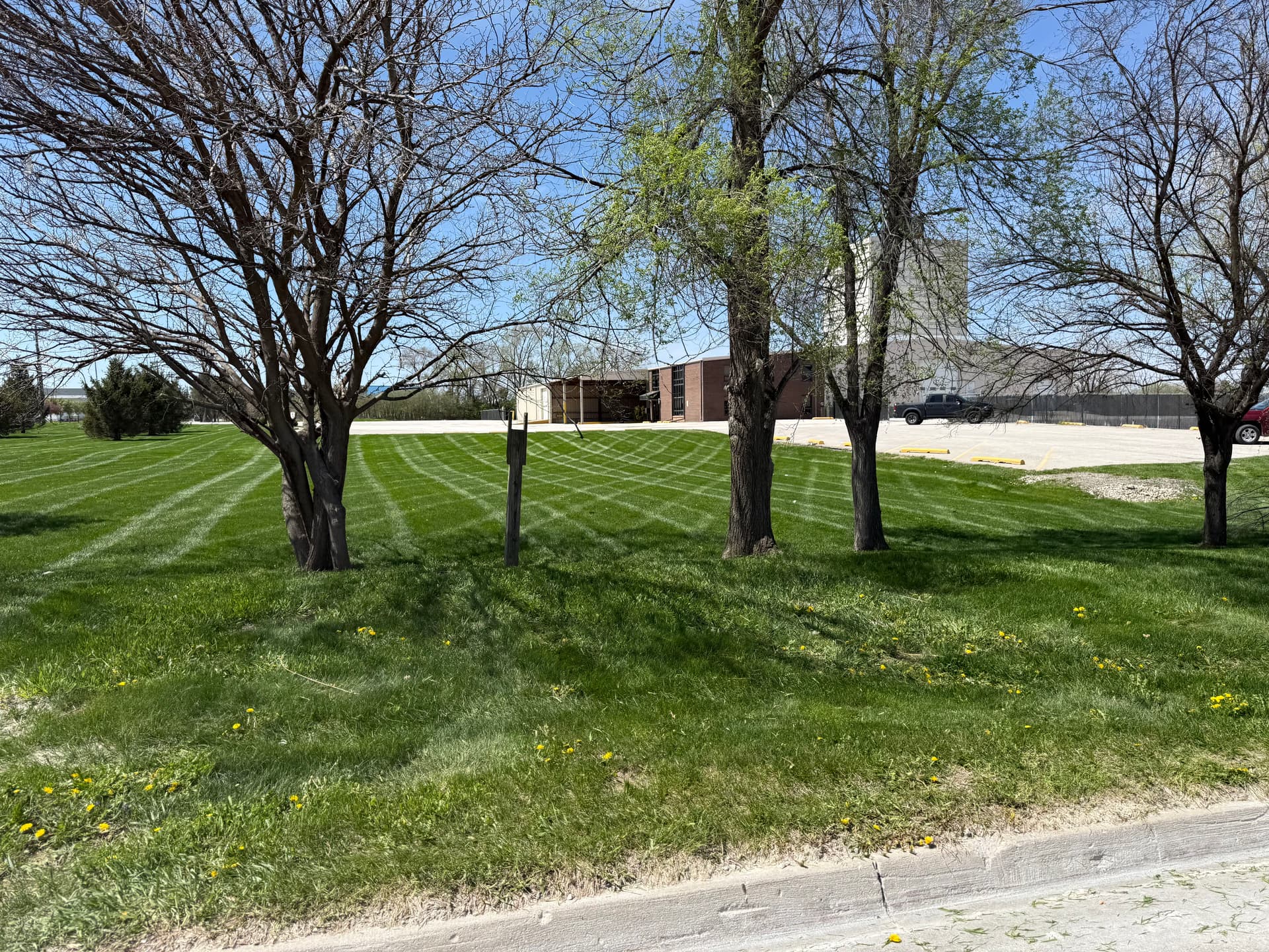 Weekly Commercial Lawn Mowing at a Grimes Iowa Concrete Plant image
