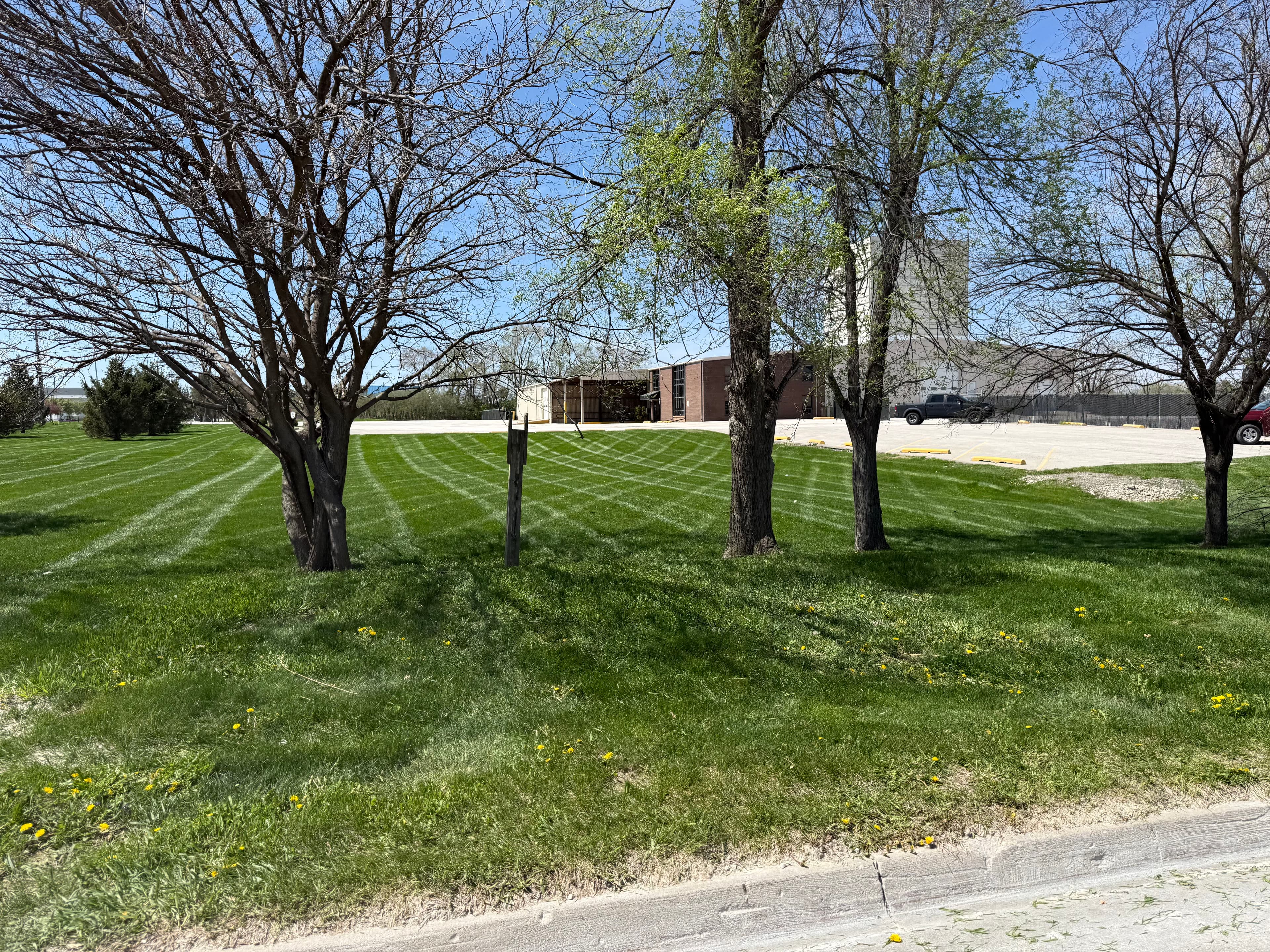 Project Weekly Commercial Lawn Mowing at a Grimes Iowa Concrete Plant image