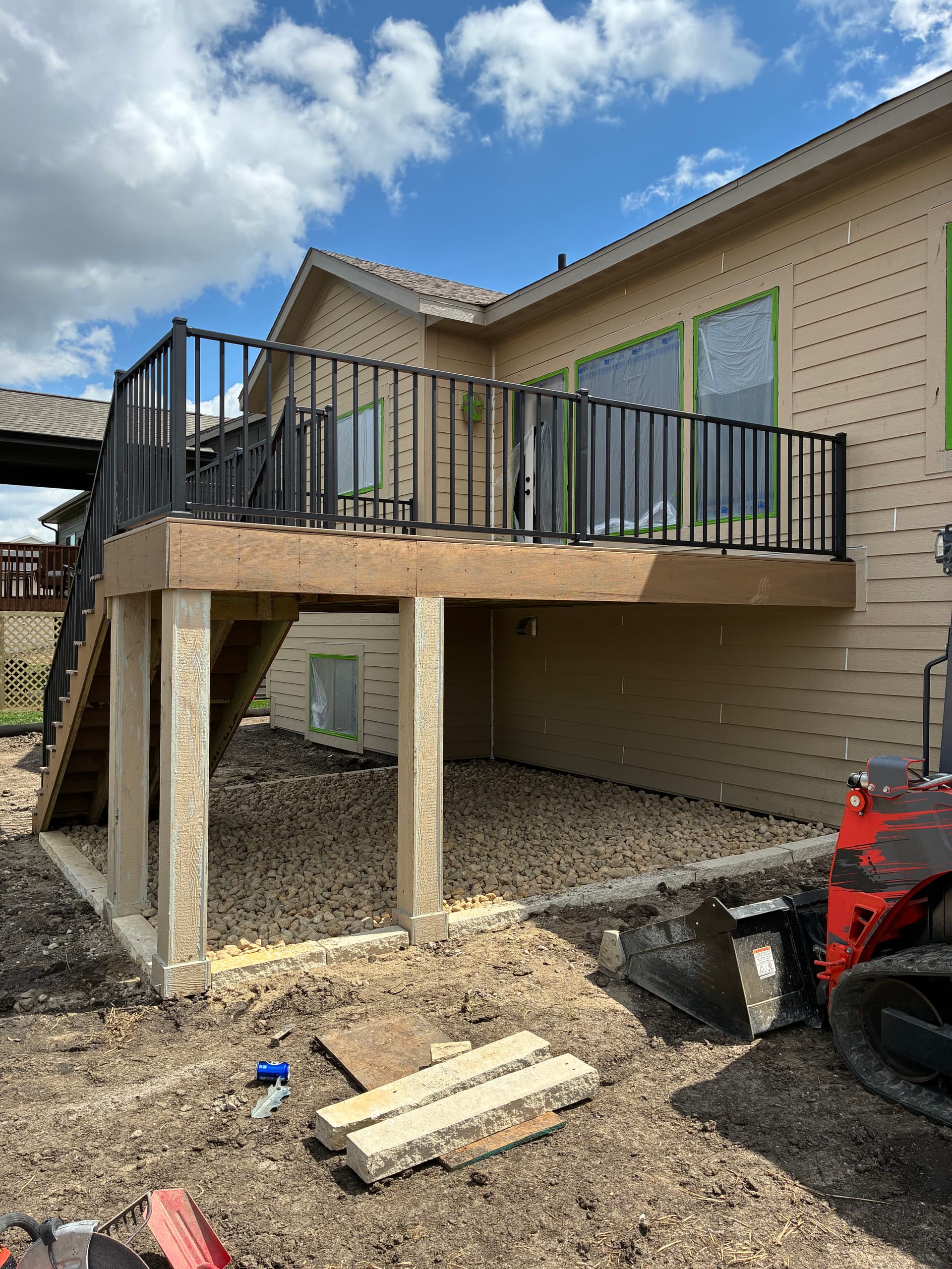 Gallery photos for New Construction Landscape Work with Iowa Buff and River Rock: Image #2