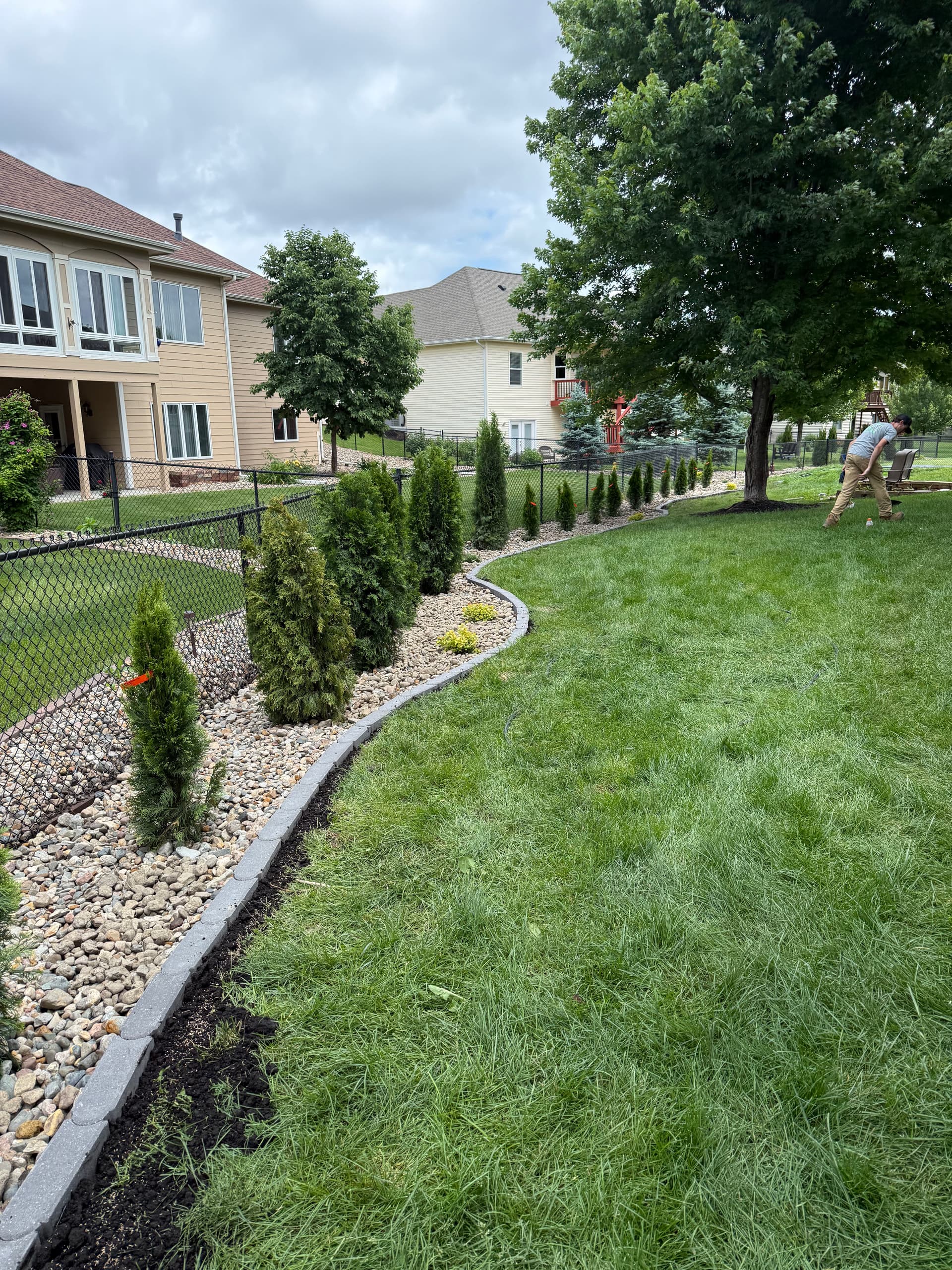 Gallery photos for Urbandale Backyard Gets Fresh Beds, Rock and New Plantings: Image #1