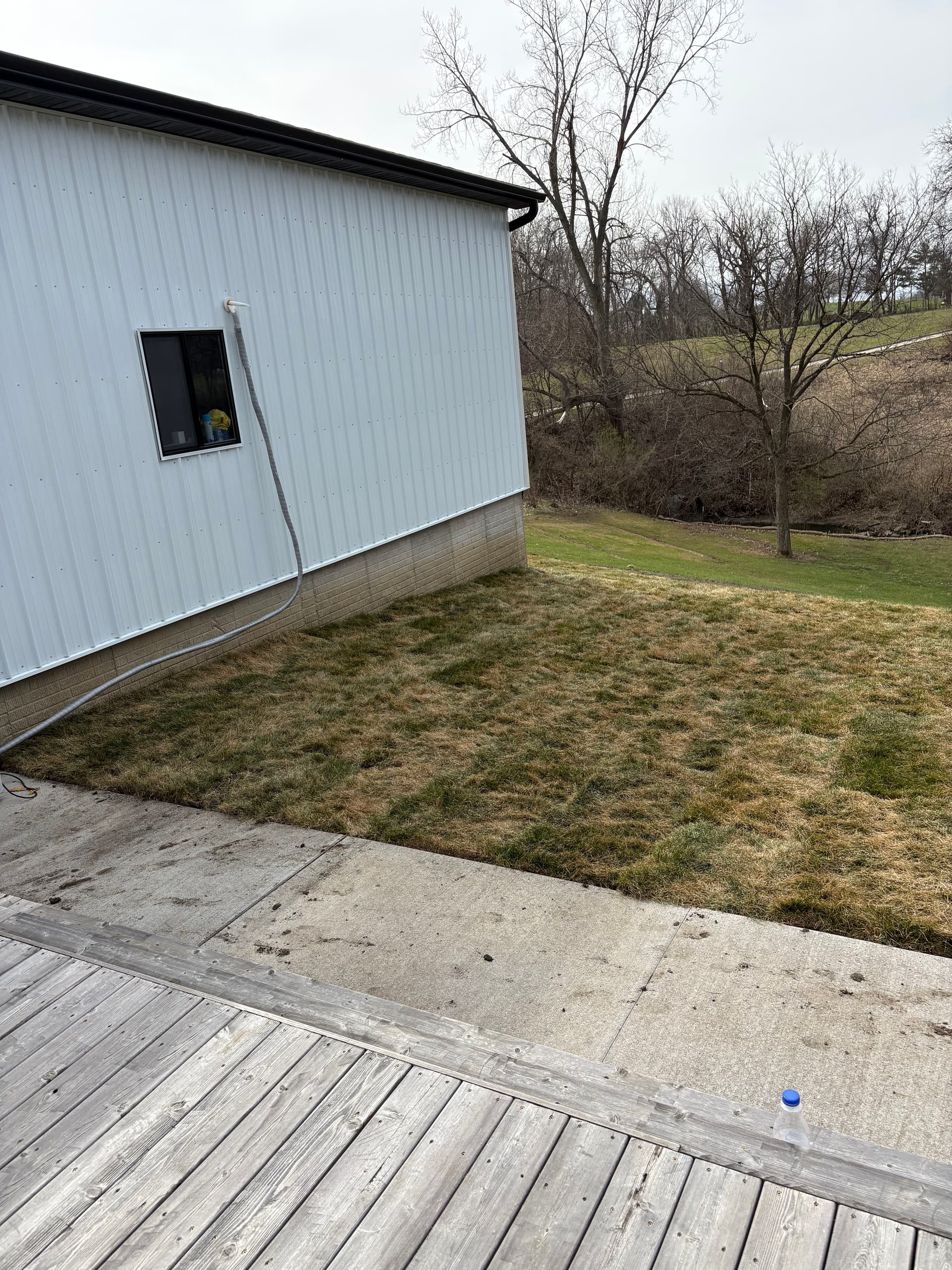 Gallery photos for French Drain Install, Full Regrade and Sod Around New Garage in Ankeny: Image #9