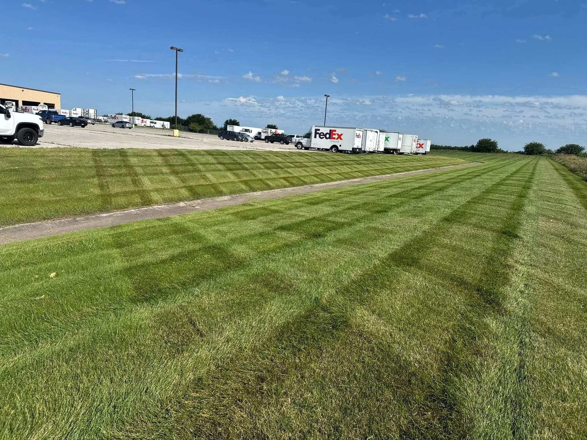Gallery photos for Weekly Commercial Lawn Mowing at a Grimes Trucking Facility: Image #1