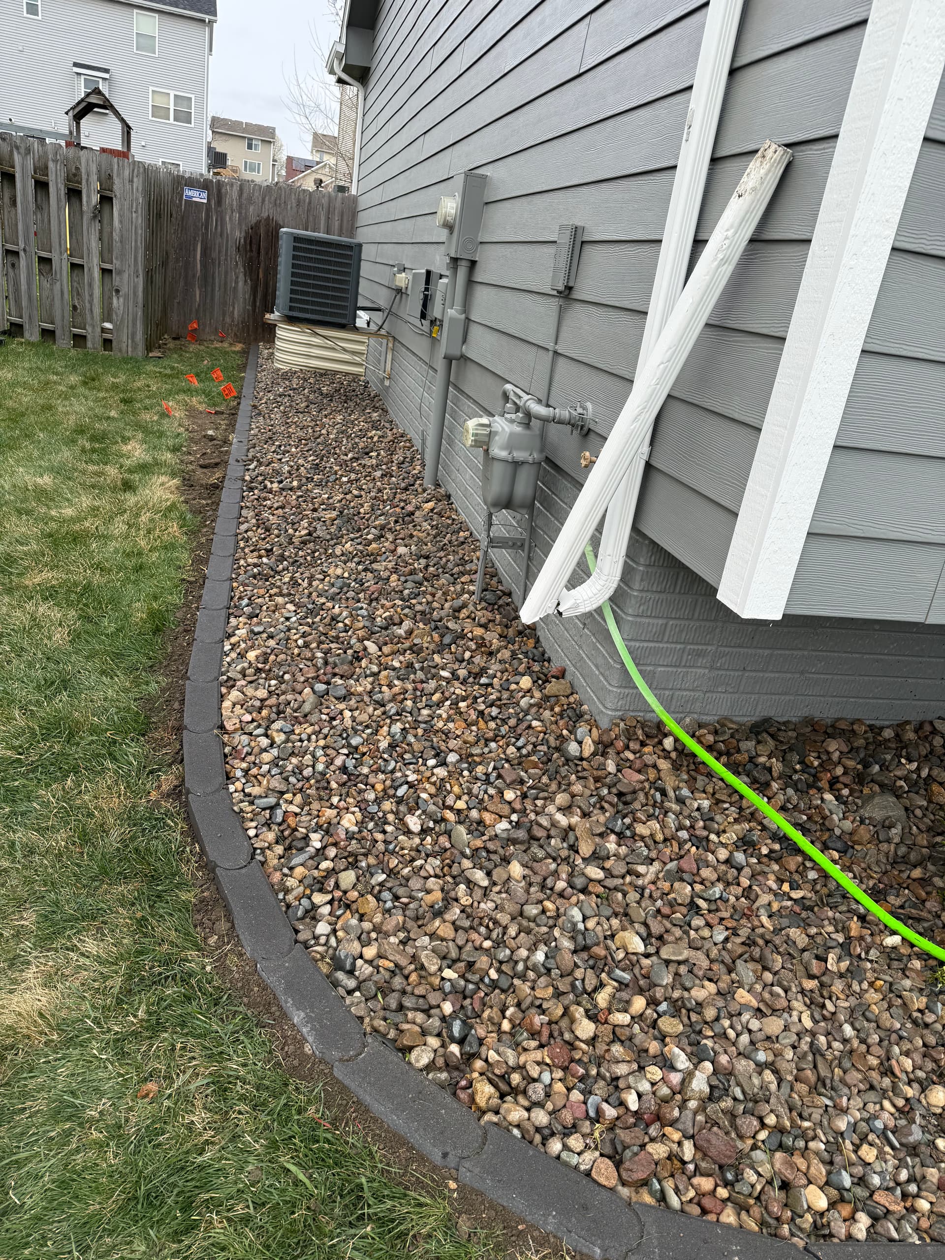 Gallery photos for River Rock and Bullet Edger Bed Install in Altoona Iowa: Image #2