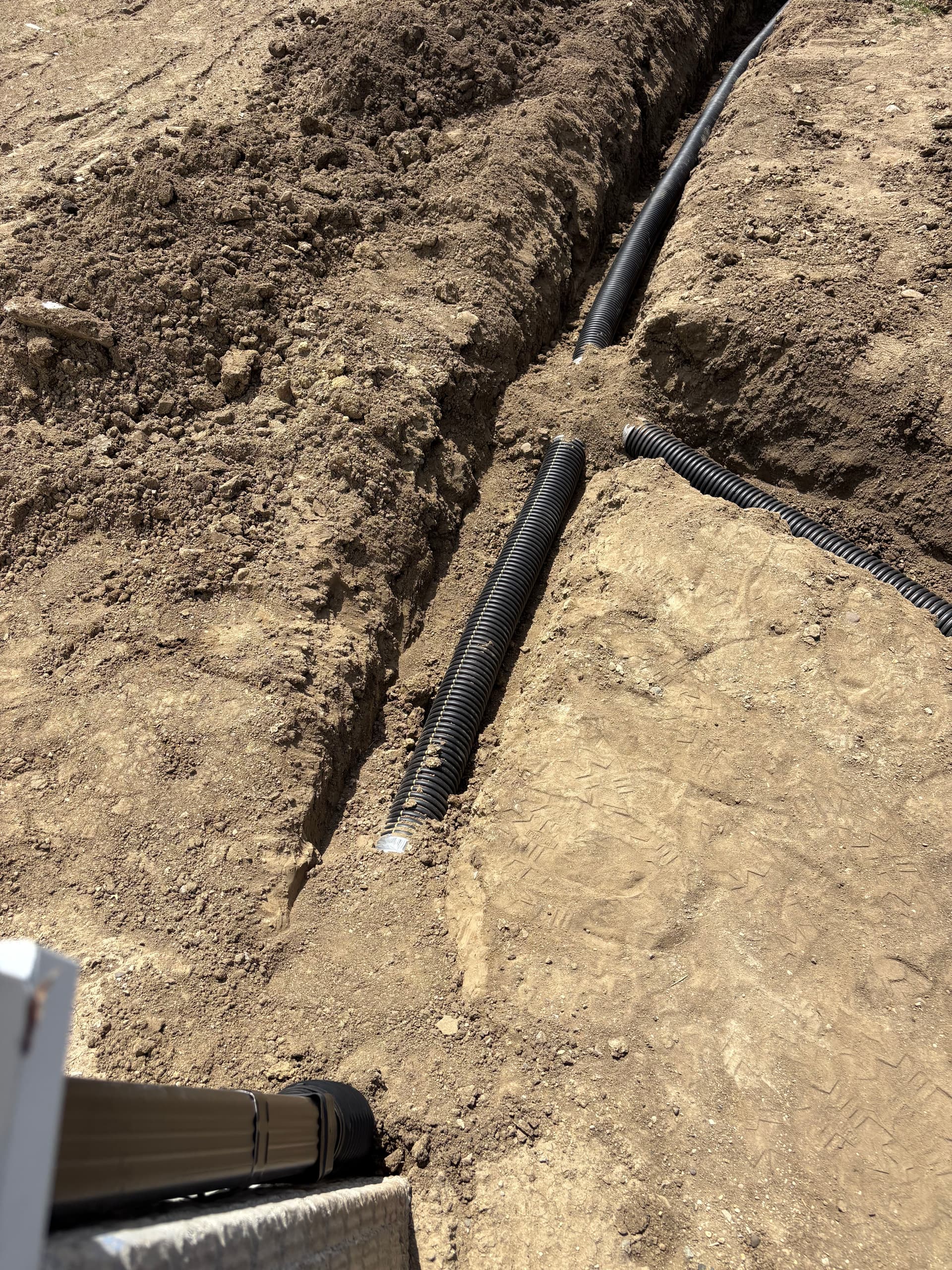 French Drain Install, Full Regrade and Sod Around New Garage in Ankeny image