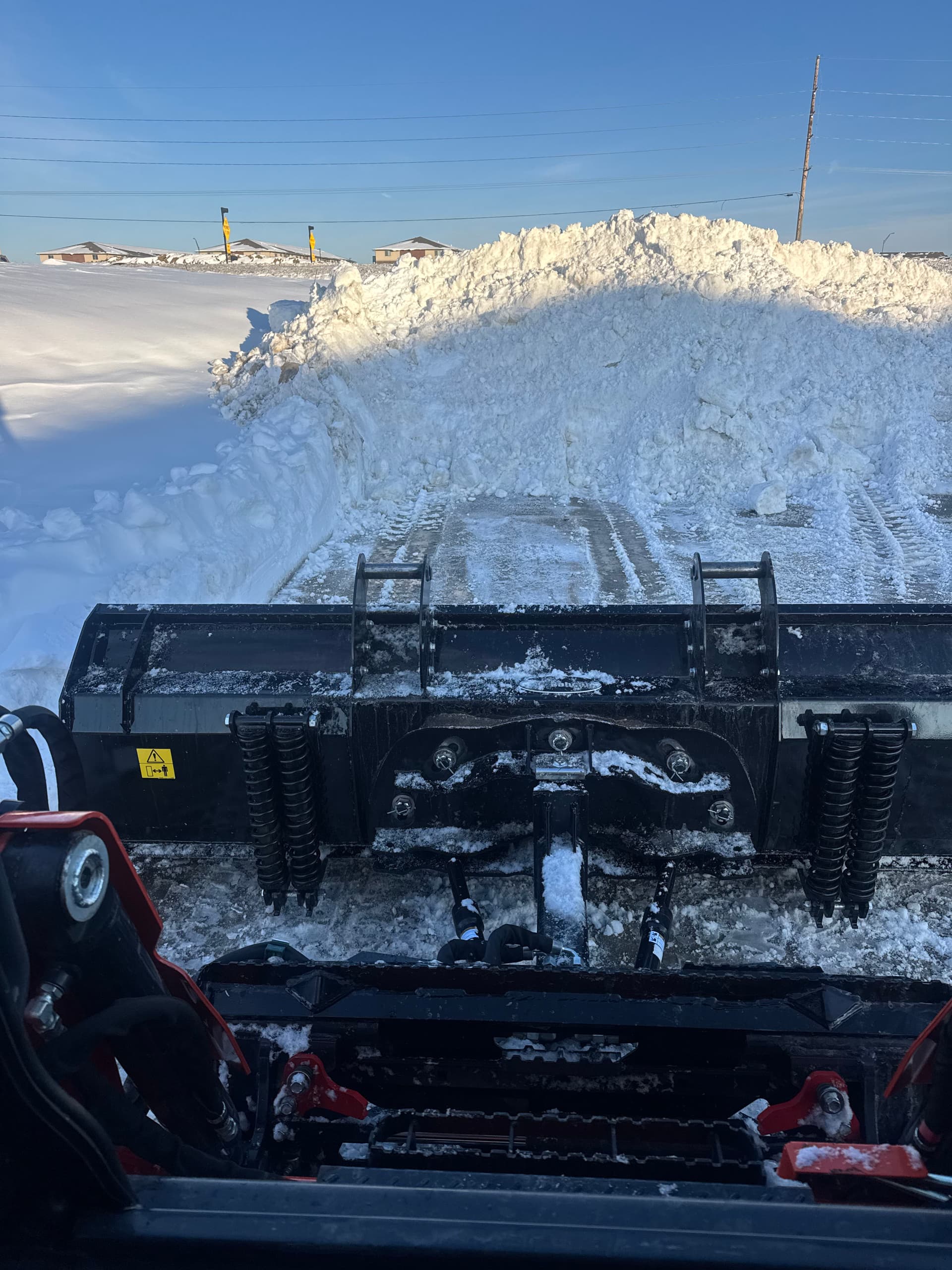 Gallery photos for Wind Drift Snow Removal at a Grimes Commercial Property: Image #1