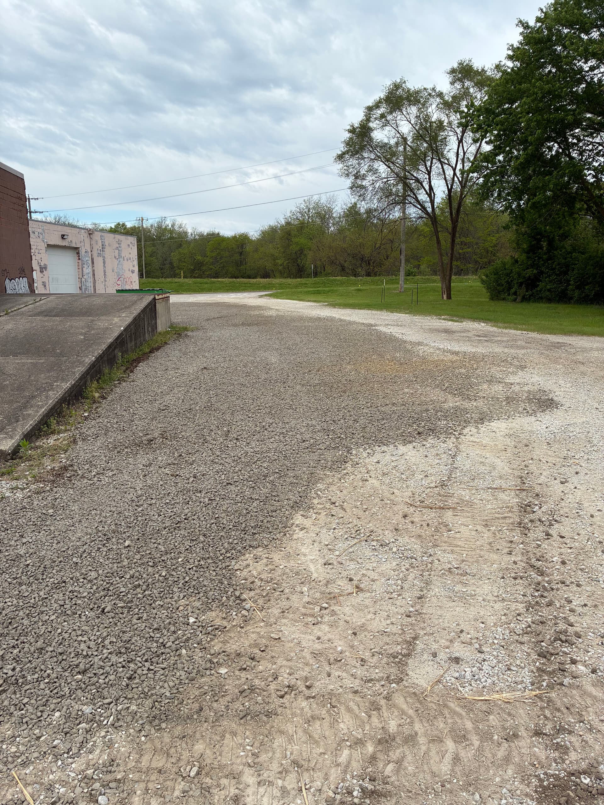20 Tons of Gravel Fixes a Soggy Shop Lot in Central Des Moines