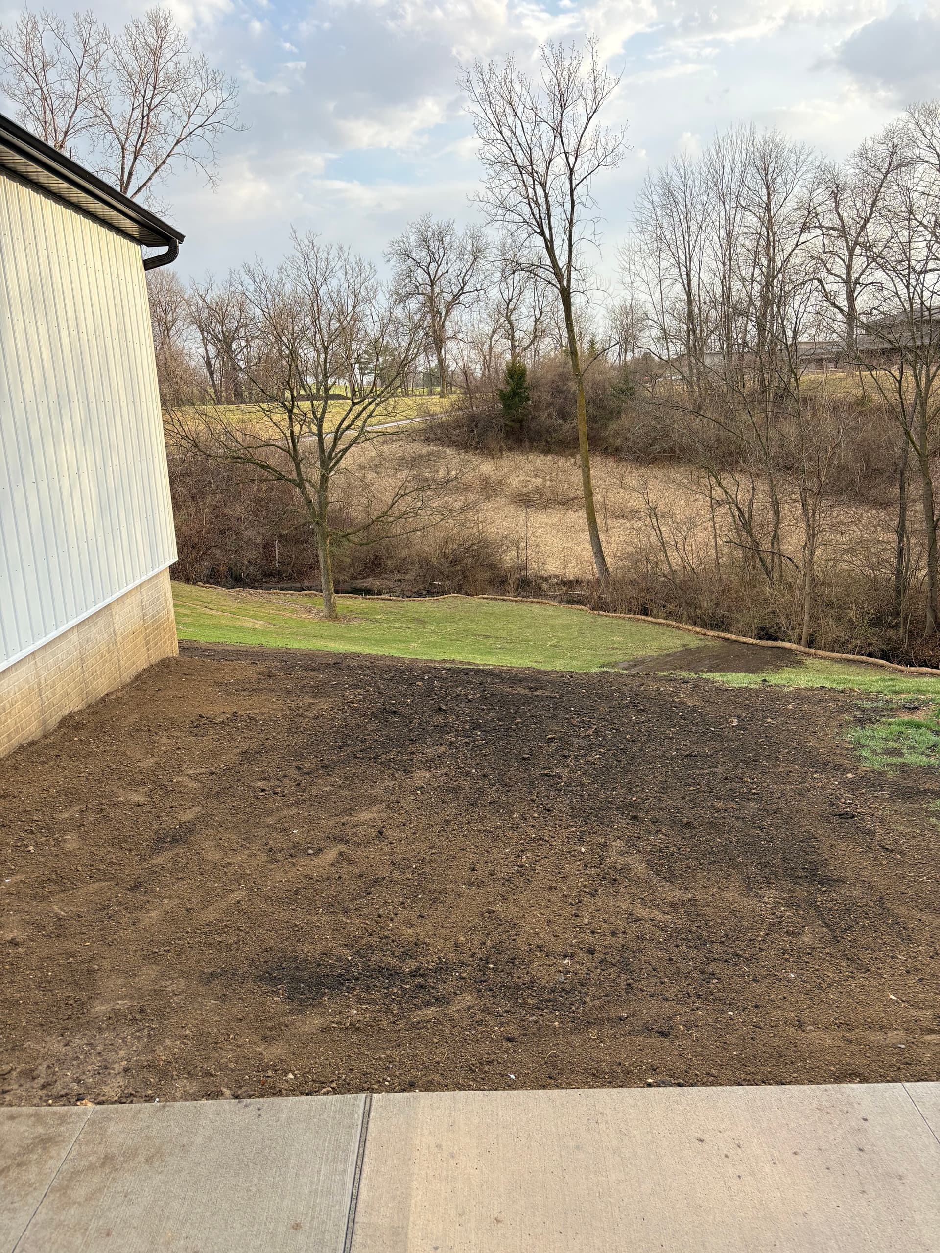 Gallery photos for French Drain Install, Full Regrade and Sod Around New Garage in Ankeny: Image #4
