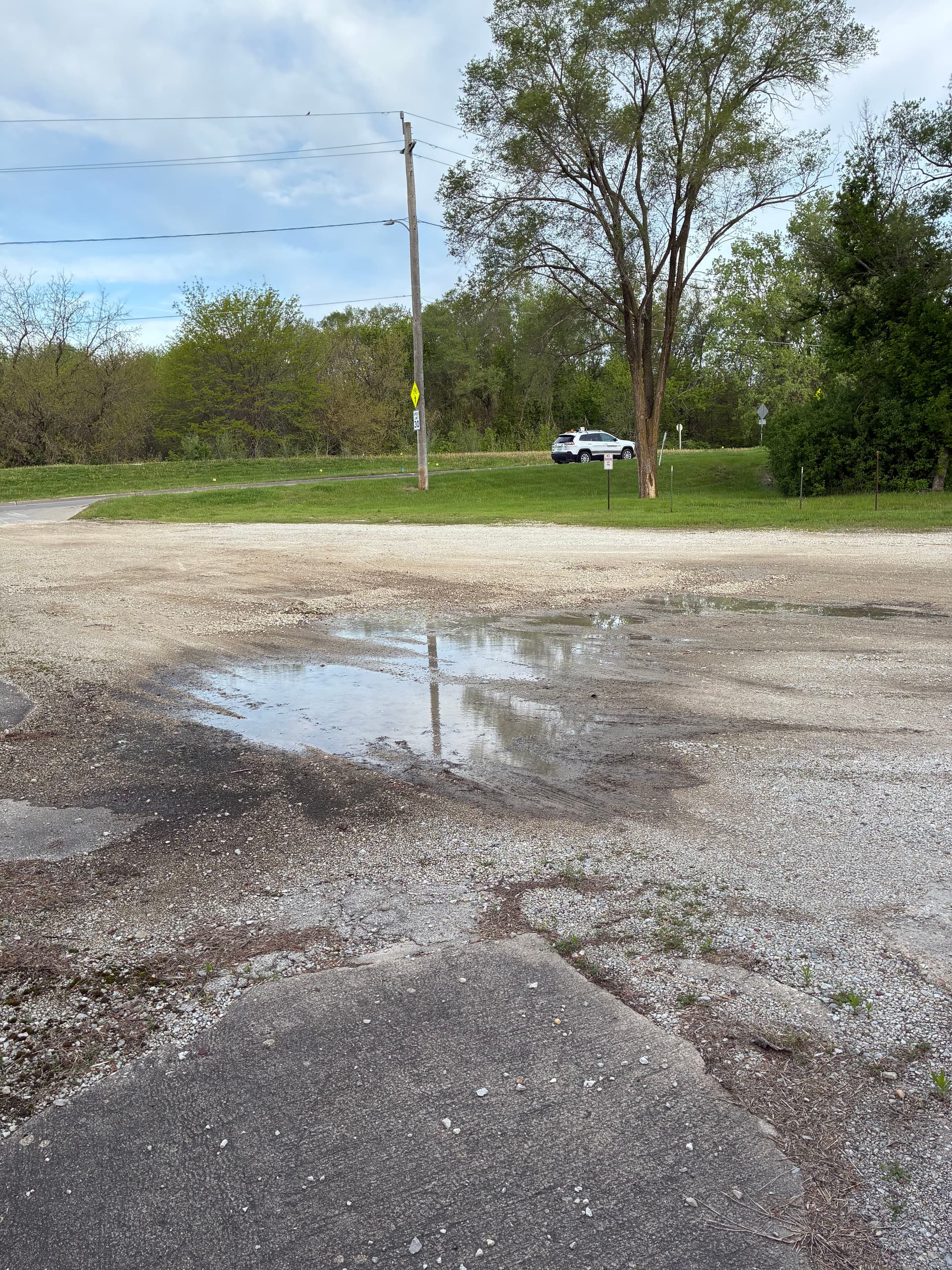 20 Tons of Gravel Fixes a Soggy Shop Lot in Central Des Moines