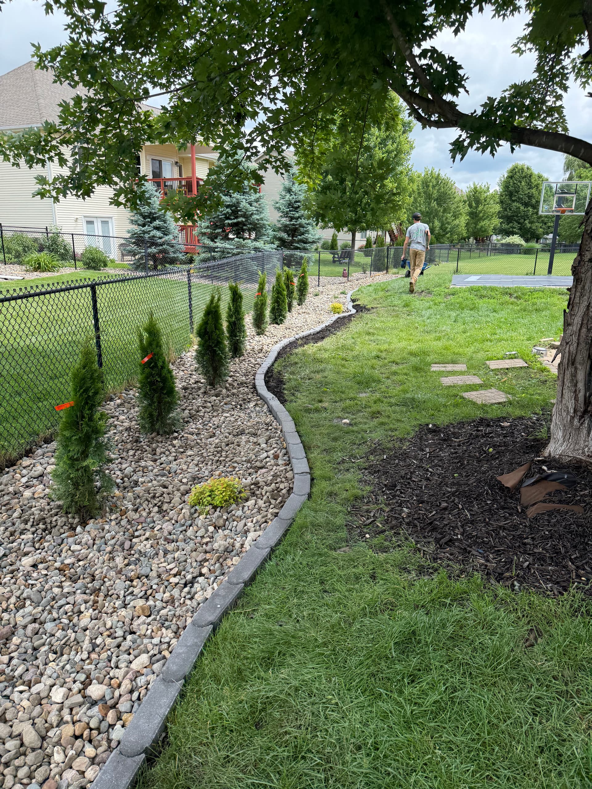 Gallery photos for Urbandale Backyard Gets Fresh Beds, Rock and New Plantings: Image #3