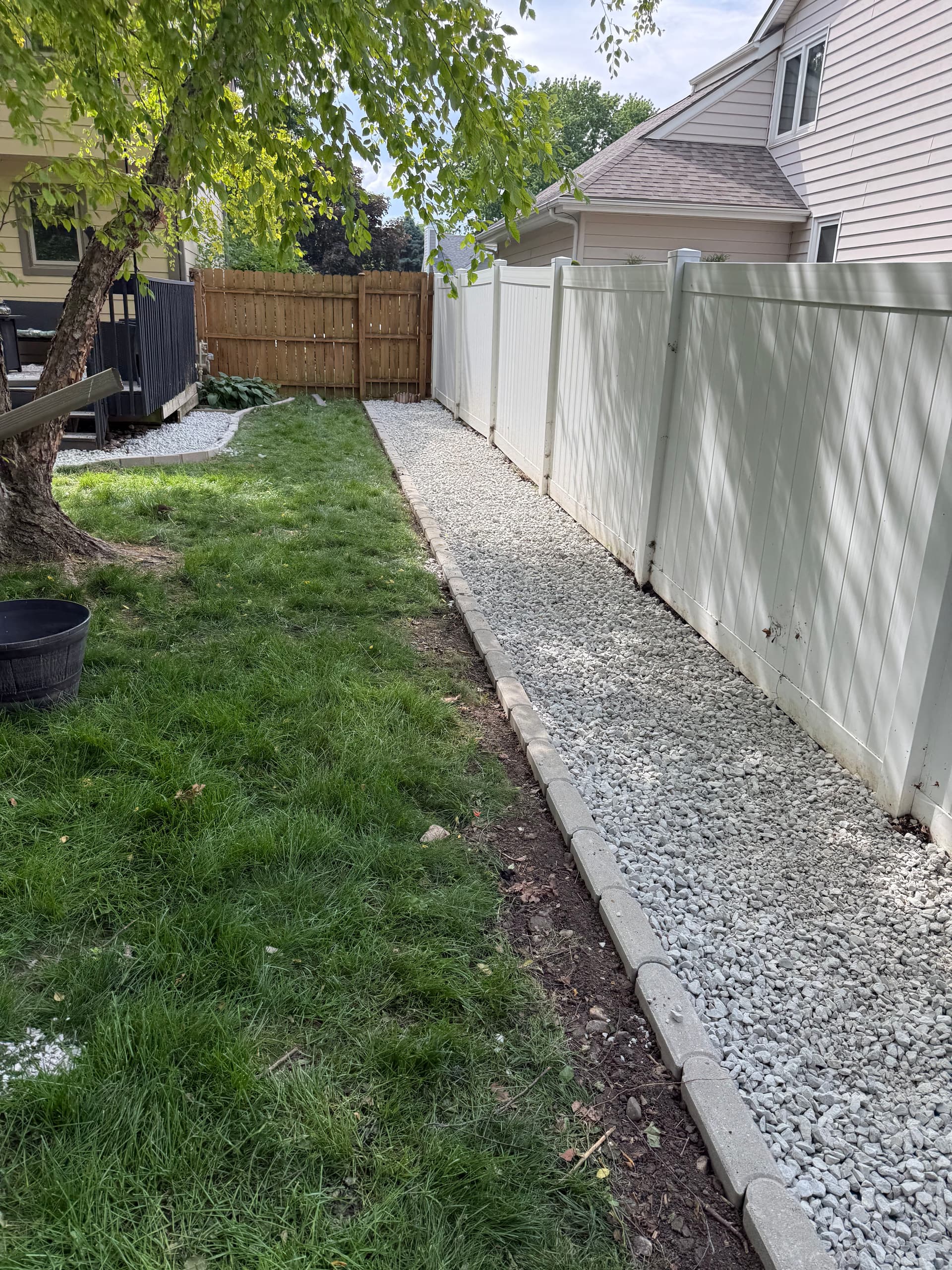 Muddy Backyard Gets a Rock and Edging Overhaul image