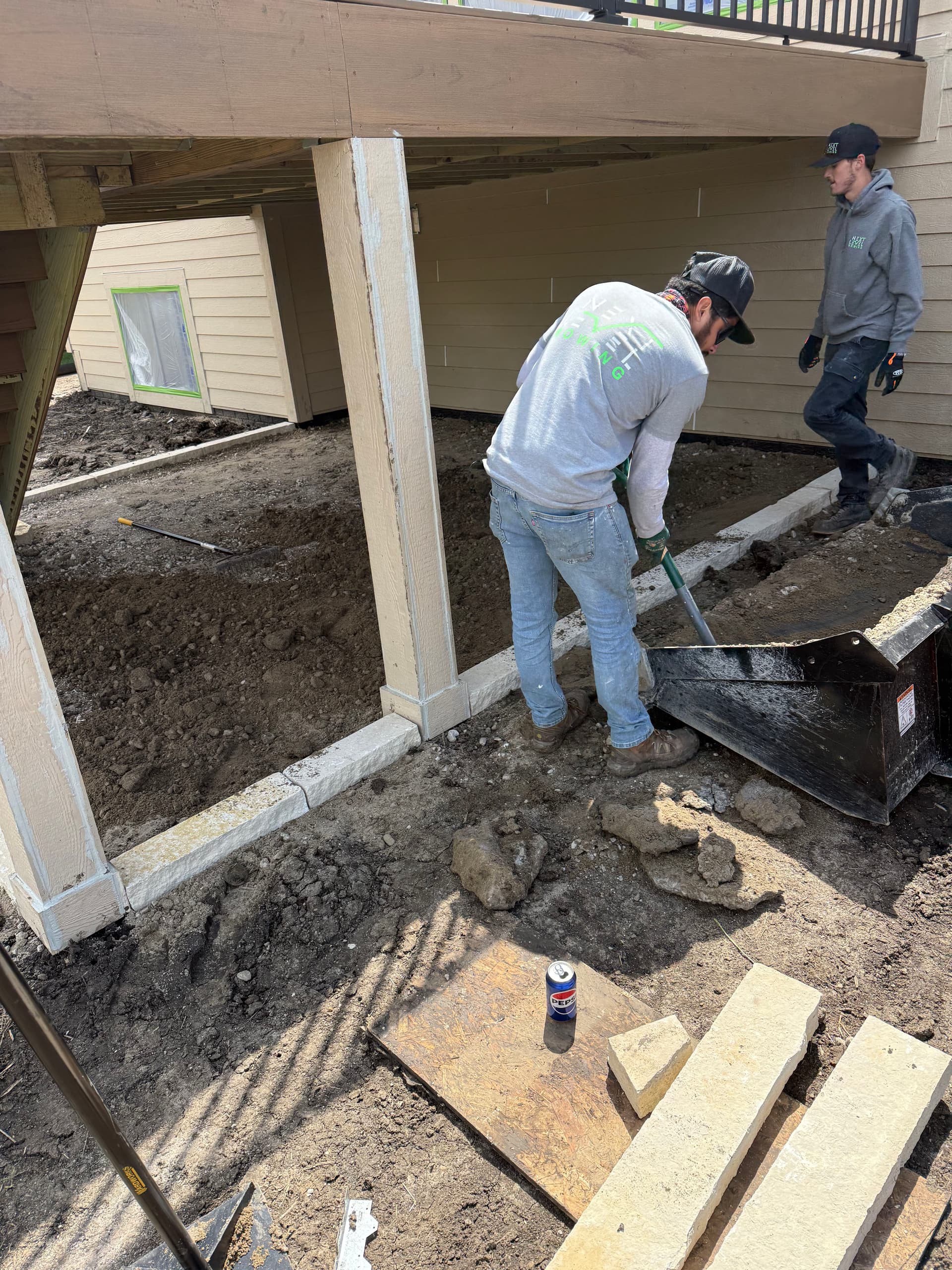 Gallery photos for New Construction Landscape Work with Iowa Buff and River Rock: Image #6