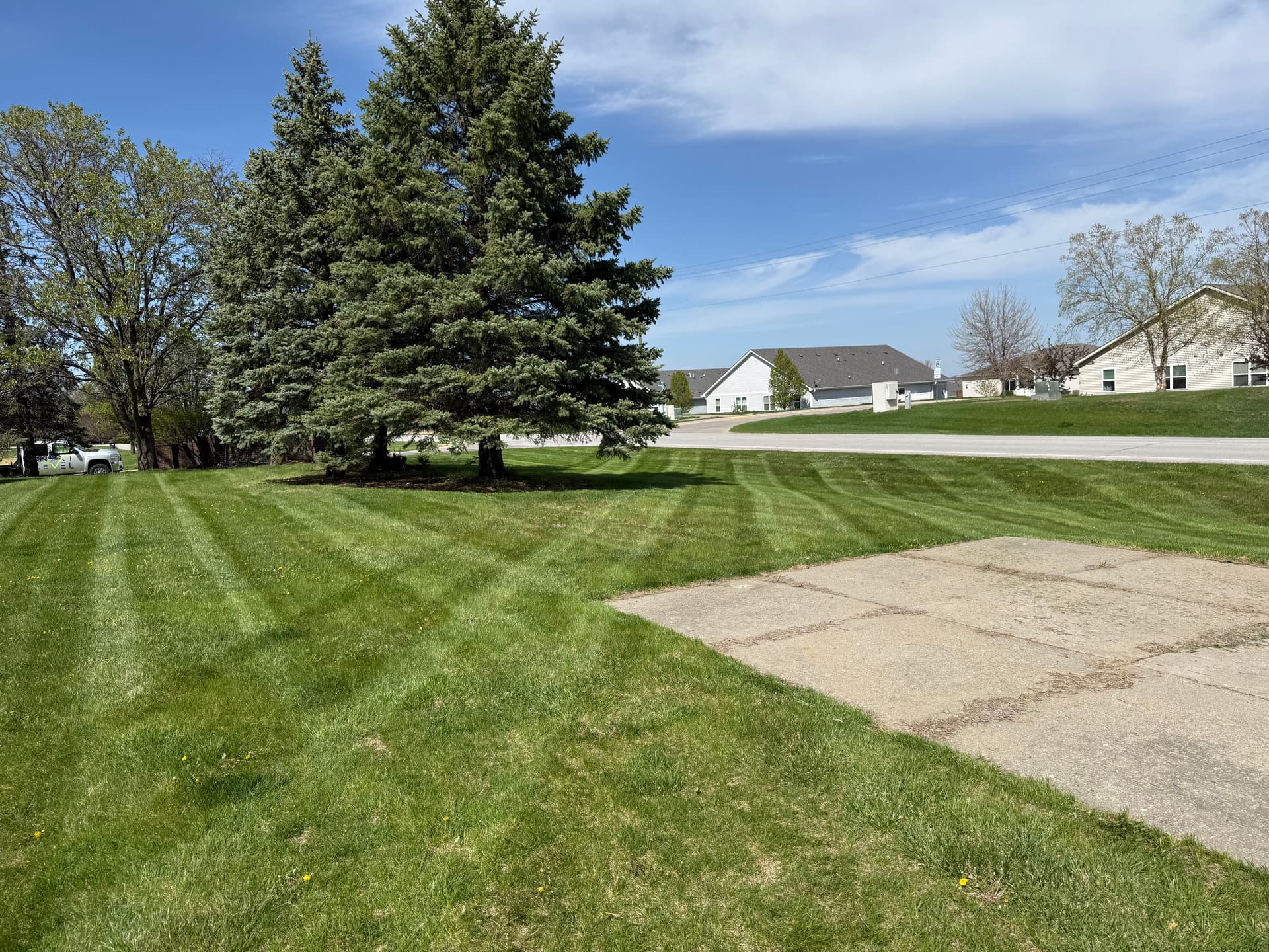 Weekly Lawn Mowing on a Big Corner Lot in Altoona Iowa image