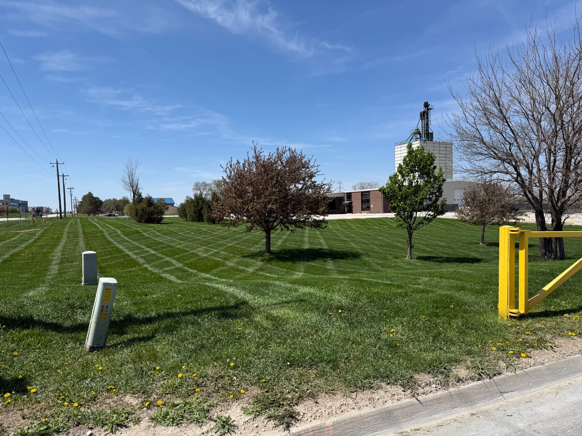 Gallery photos for Weekly Commercial Lawn Mowing at a Grimes Iowa Concrete Plant: Image #1