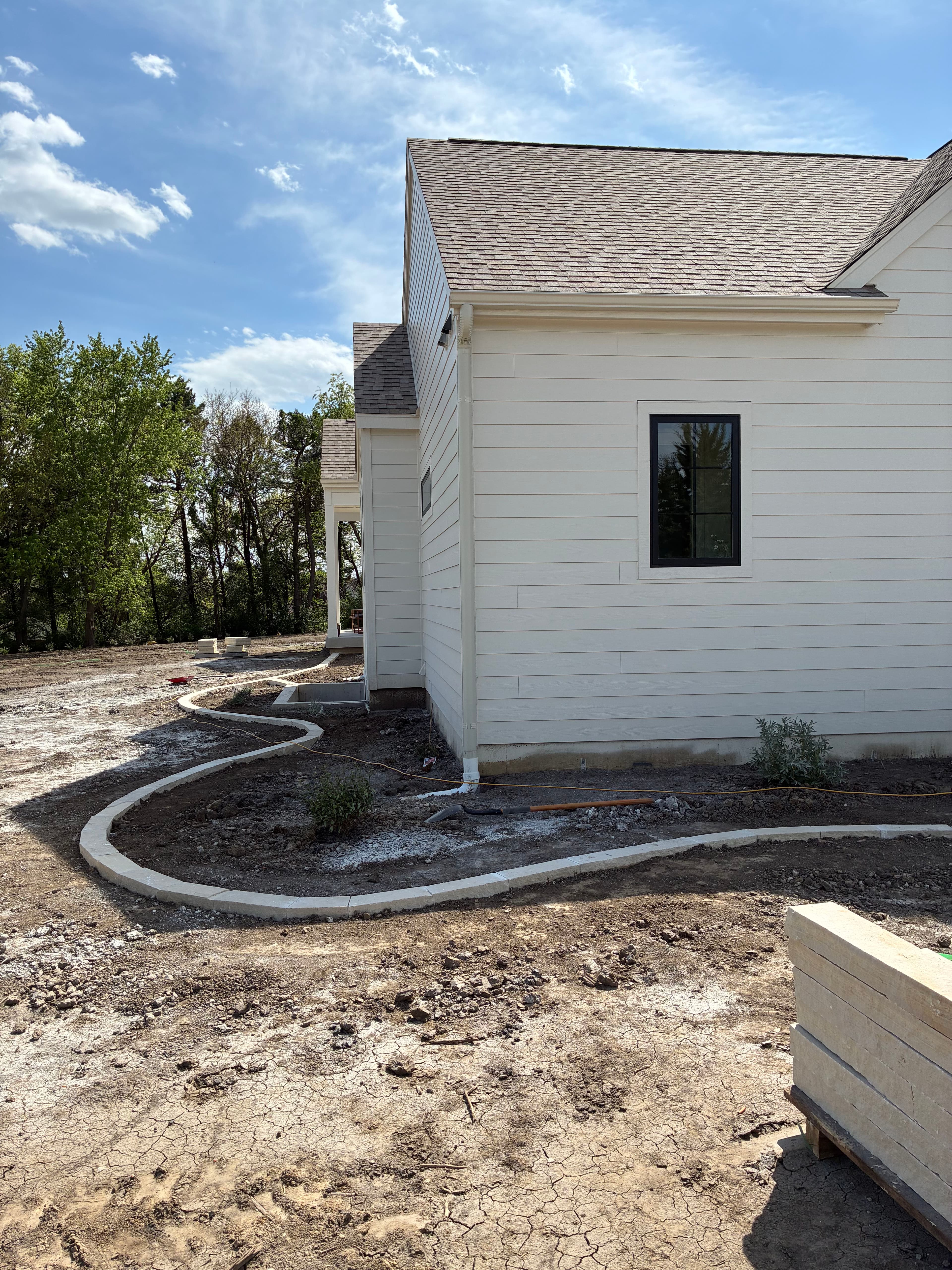 Project Iowa Buff Edger Install Wraps Custom Home in West Des Moines image