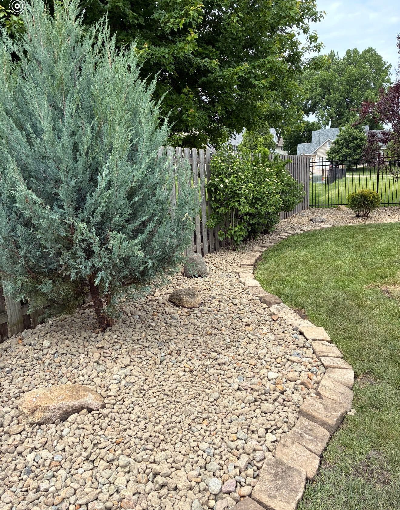 Backyard Landscape Bed Upgrade with River Rock in Johnson image