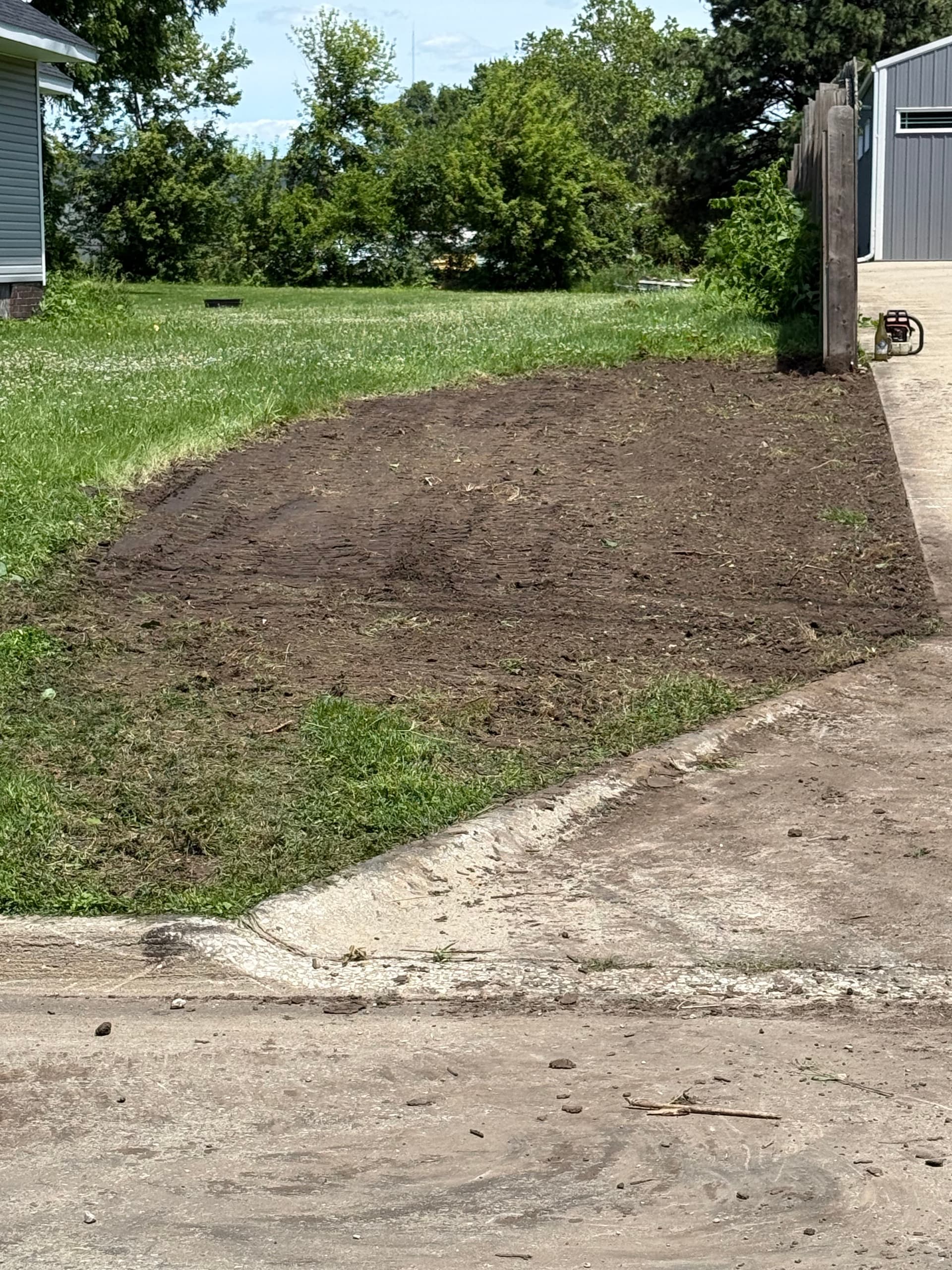 Gallery photos for Overgrown Flower Bed Cleared and Prepped for Grass: Image #3