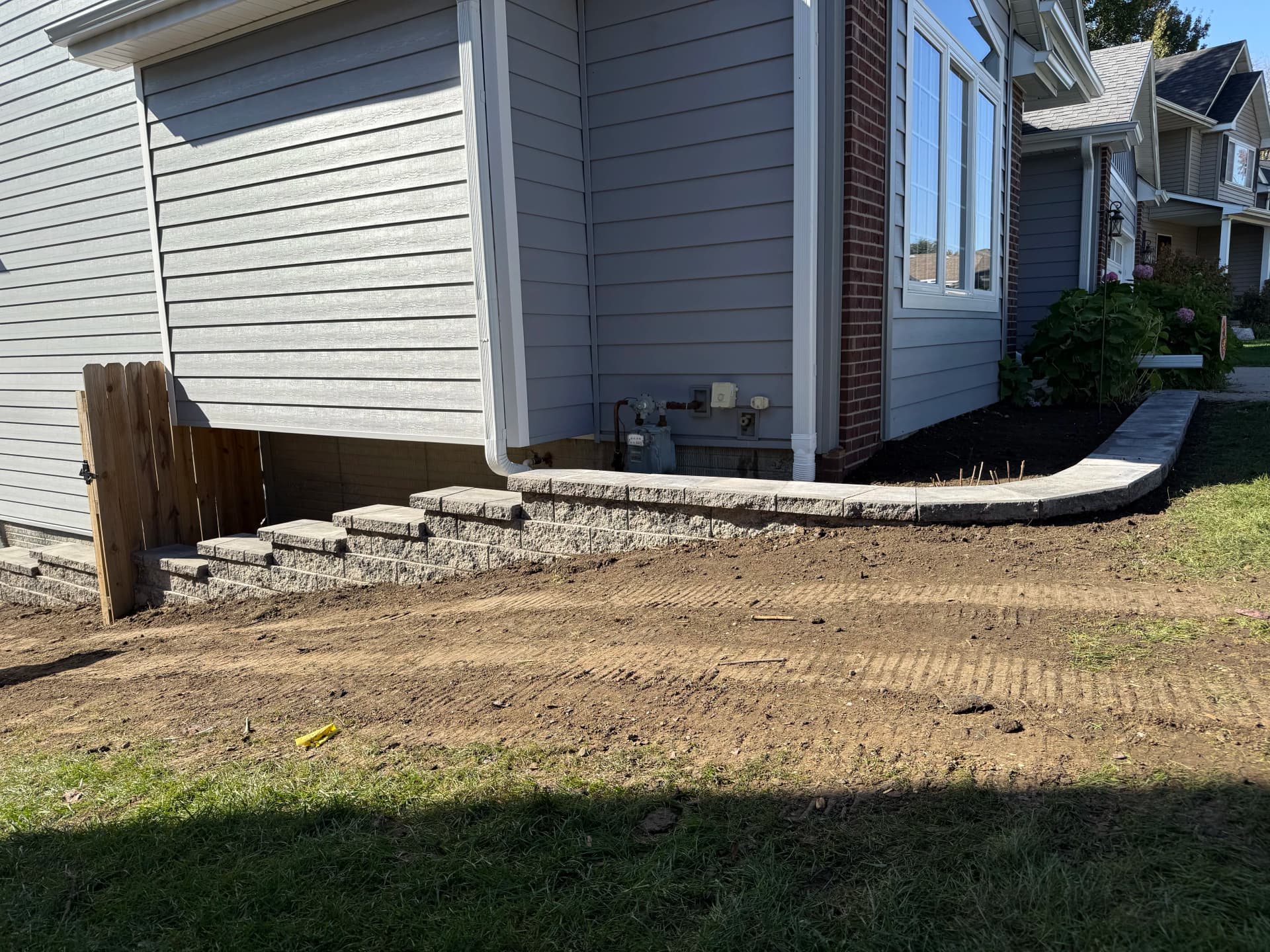 Gallery photos for French Drain Installation and Retaining Walls Fix a Serious Drainage Problem: Image #2