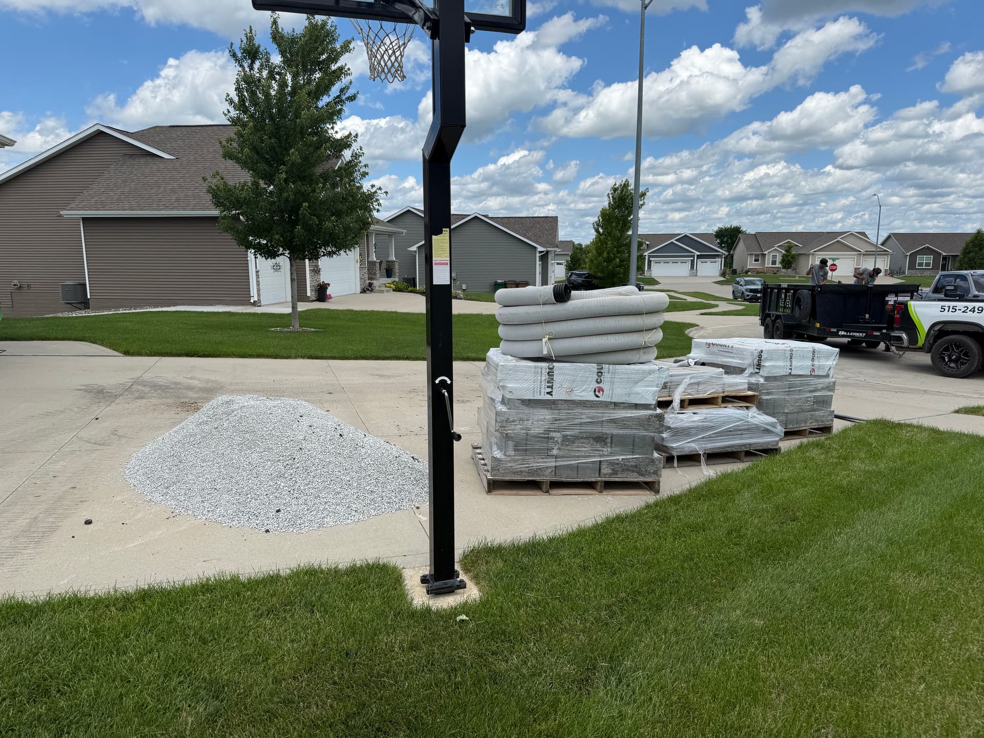 Pool Pad Build With Canyon Block Retaining Wall and Flagstone Path image