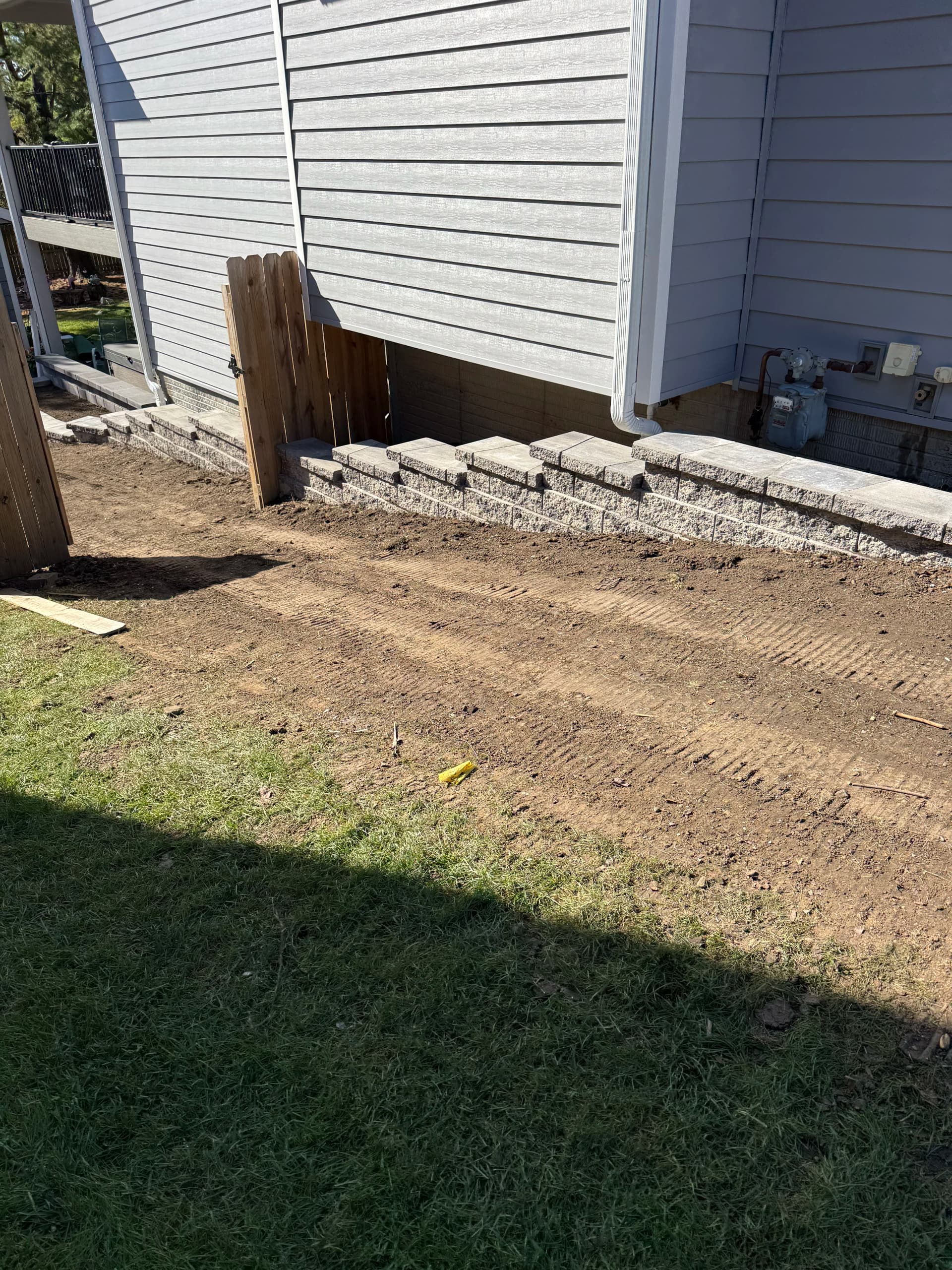 Gallery photos for French Drain Installation and Retaining Walls Fix a Serious Drainage Problem: Image #1