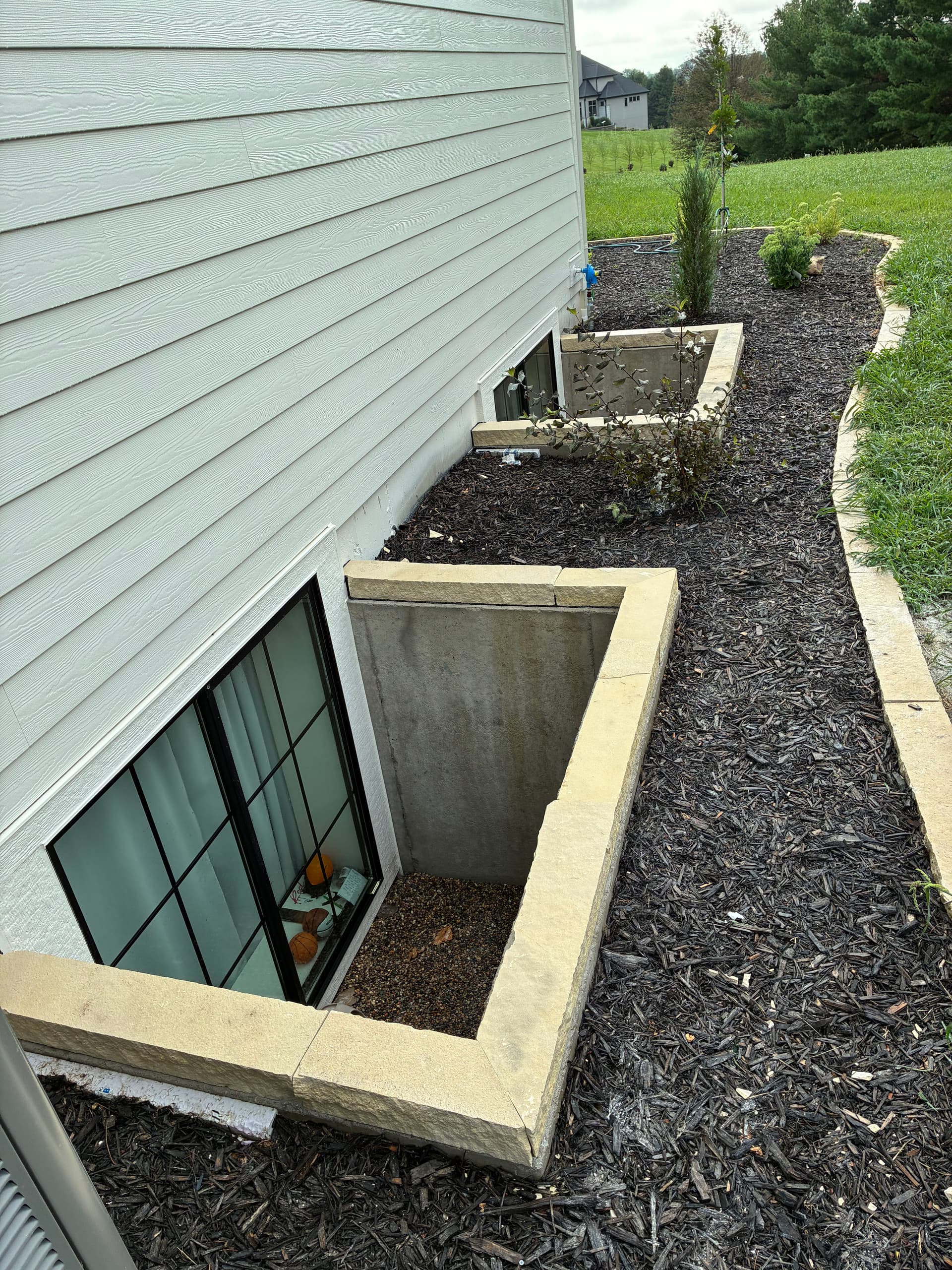 Gallery photos for Egress Window Well Capping That Actually Looks Good: Image #2