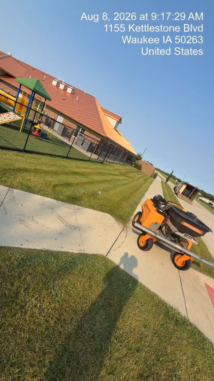 Gallery photos for Midseason Lawn Maintenance at a Waukee Daycare Property: Image #2
