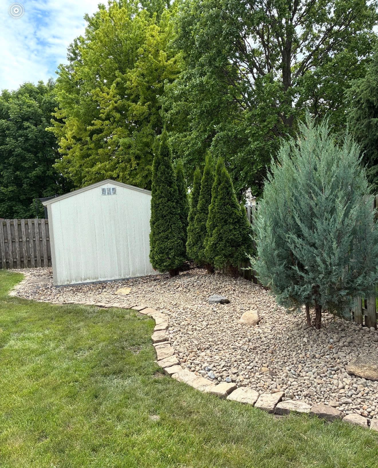 Gallery photos for Backyard Landscape Bed Upgrade with River Rock in Johnson: Image #1