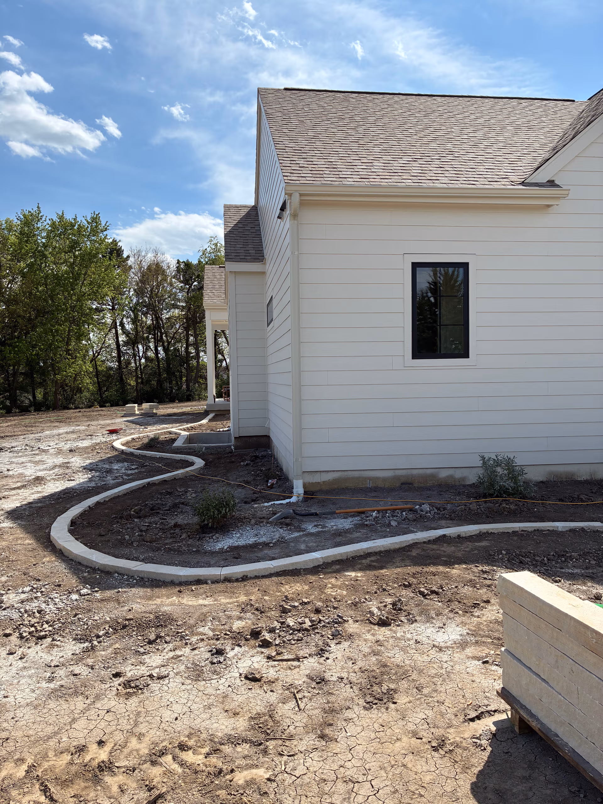 Iowa Buff Edger Install Wraps Custom Home in West Des Moines image