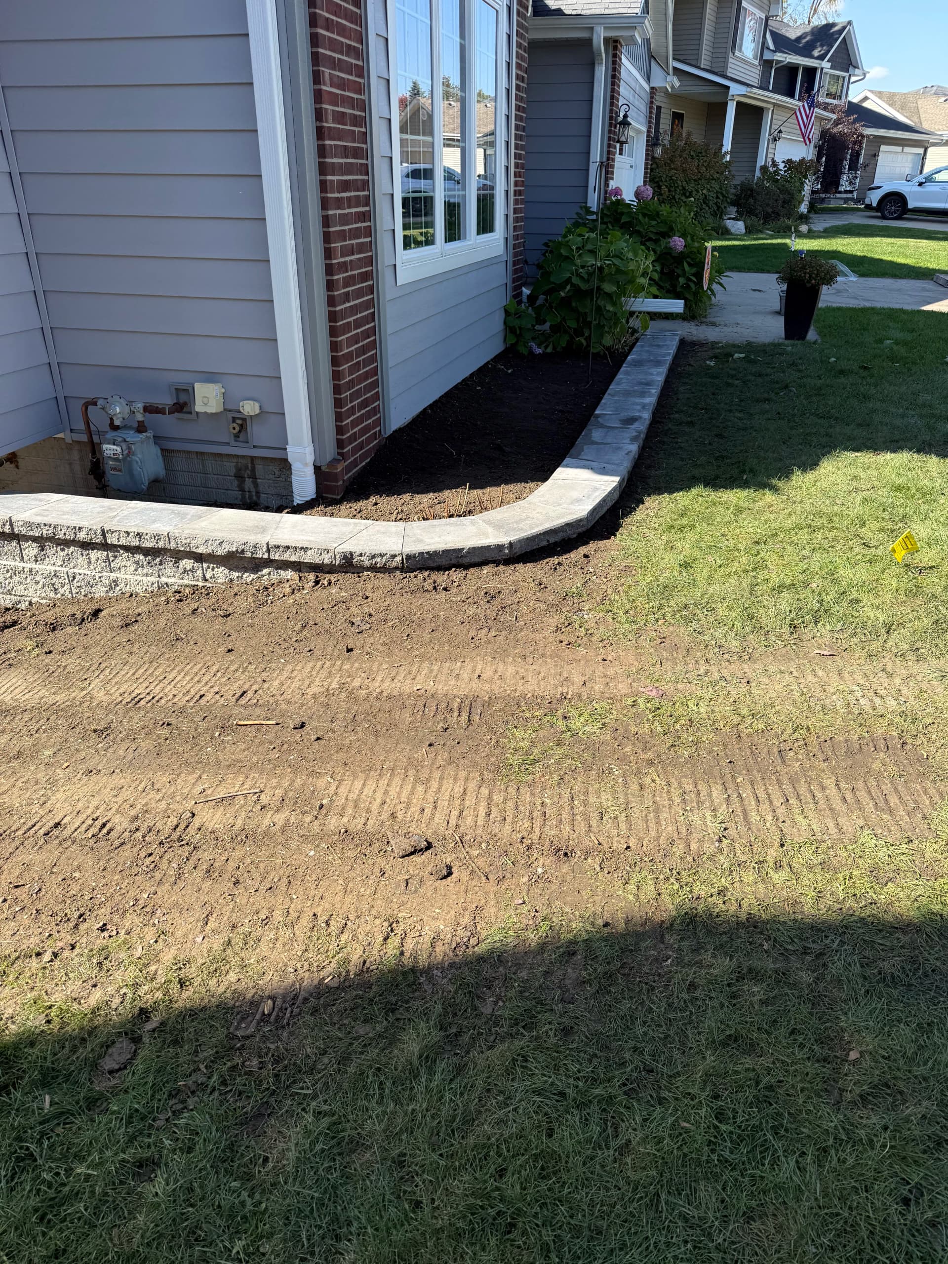 French Drain Installation and Retaining Walls Fix a Serious Drainage Problem image